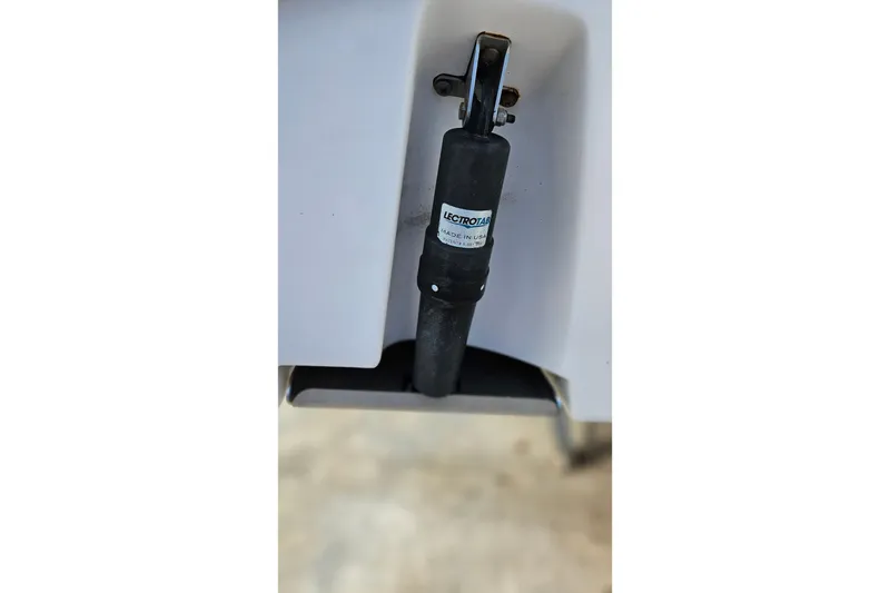 Slide: The Image of Trim tab actuator on 2015 Everglades 255 Center Console boat. - 47