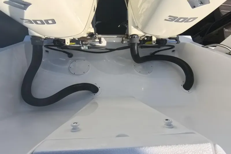 Slide: The Image of 2005 Intrepid 348 Walkaround boat with dual 300 horsepower engines, rear view. - 22