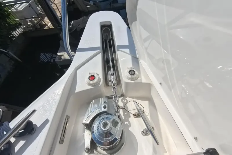 Slide: The Image of 2005 Intrepid 348 Walkaround boat anchor system with chain and controls. - 63