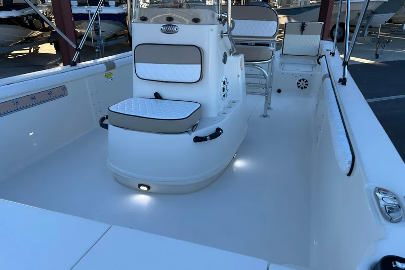 Slide: The Image of 2020 Carolina Skiff 21 LS boat interior with seating and console. - 10