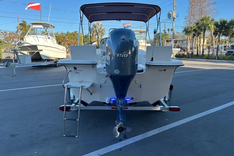 Slide: The Image of 2020 Carolina Skiff 21 LS boat with Yamaha 150 engine on trailer. - 3