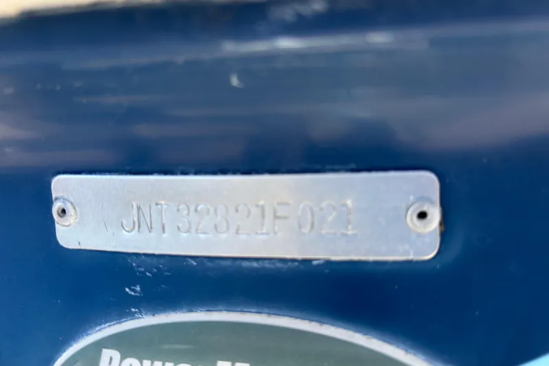 Slide: The Image of Hull identification number on a 2021 NauticStar 203 DC boat. - 65