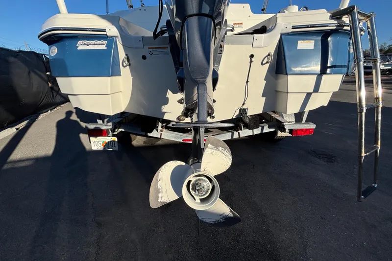 Slide: The Image of 2021 NauticStar 203 DC boat on trailer, close-up view of hitch and frame. - 7