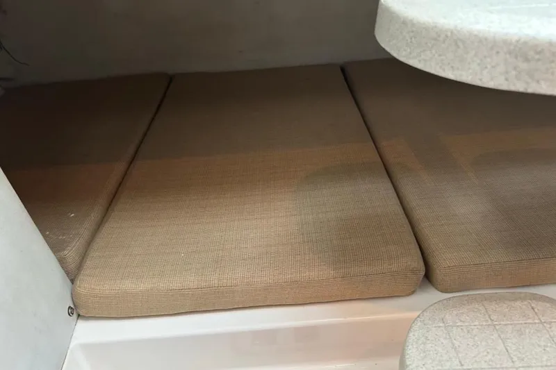 Slide: The Image of Interior cabin cushions of 2001 Wellcraft 270 Coastal O/B boat. - 10