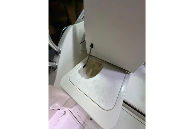 Slide: The Image of 2001 Wellcraft 270 Coastal O/B boat interior compartment detail. - 14