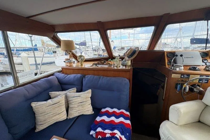 Slide: The Image of Interior of 1987 Tollycraft 34 Sundeck Motor Yacht with kitchen and seating area. - 23