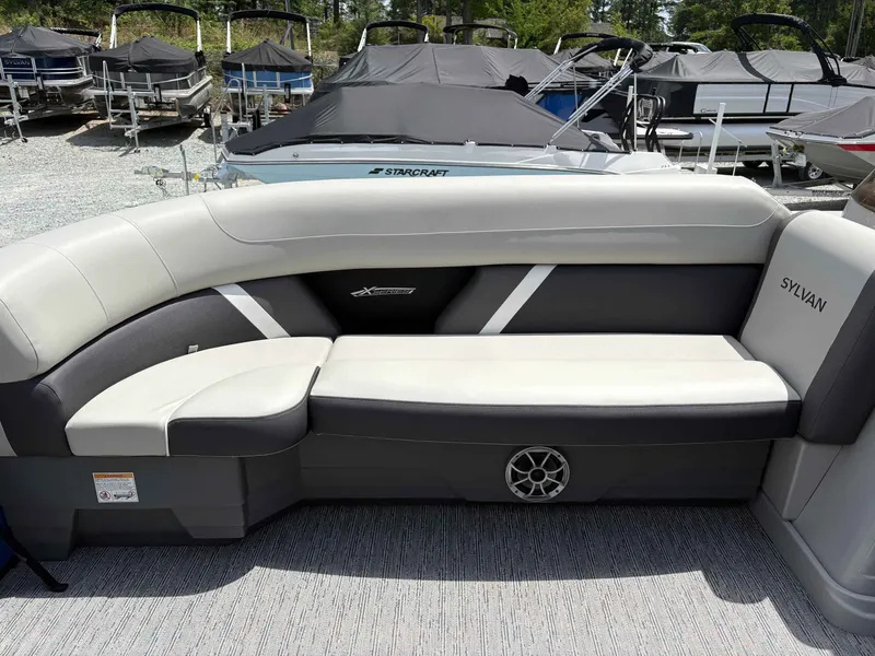 Slide: The Image of Sylvan X-5 CLZ DH 2026 boat seating with gray upholstery. - 7