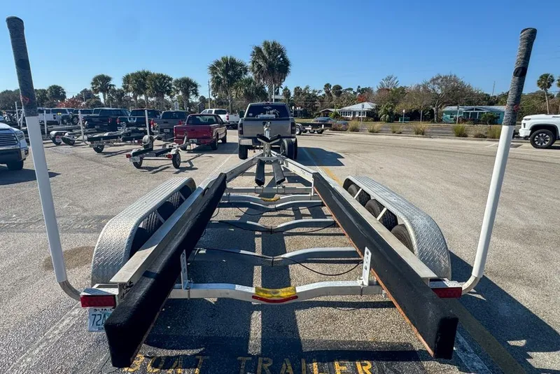 Slide: The Image of Boat trailer in parking lot, ready for 2021 Wellcraft 262 Fisherman. - 103