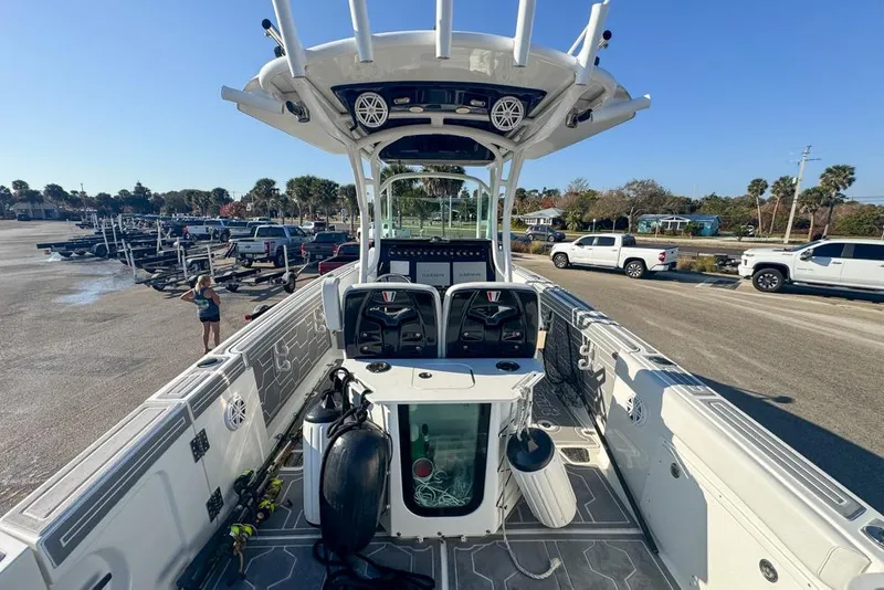 Slide: The Image of 2021 Wellcraft 262 Fisherman boat interior with modern controls and spacious deck. - 39