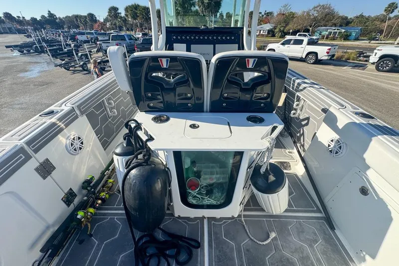 Slide: The Image of 2021 Wellcraft 262 Fisherman boat interior with fishing gear and seating. - 41