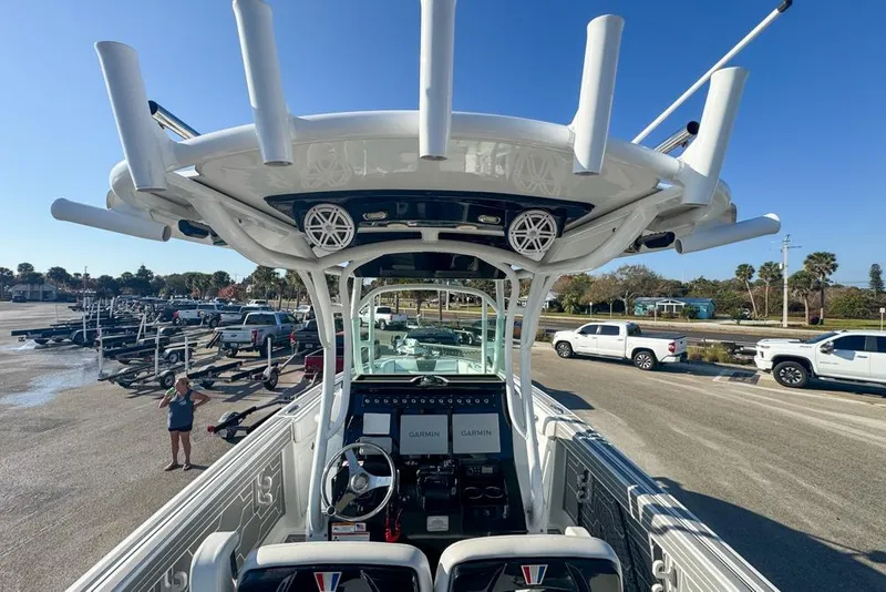 Slide: The Image of 2021 Wellcraft 262 Fisherman boat with advanced Garmin navigation system at a marina. - 44