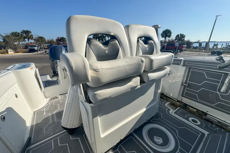 Slide: The Image of 2021 Wellcraft 262 Fisherman boat interior with dual cushioned seats and modern flooring. - 49