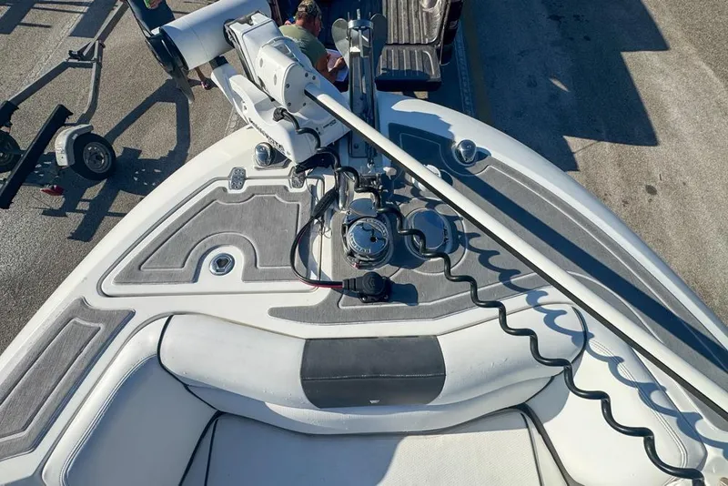 Slide: The Image of 2021 Wellcraft 262 Fisherman boat deck with fishing equipment and seating. - 66