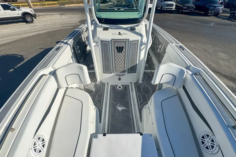 Slide: The Image of 2021 Wellcraft 262 Fisherman boat interior with seating and storage compartments. - 68
