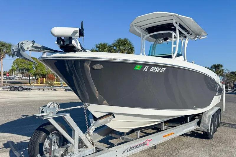 Slide: The Image of 2021 Wellcraft 262 Fisherman boat on trailer, parked outdoors. - 9
