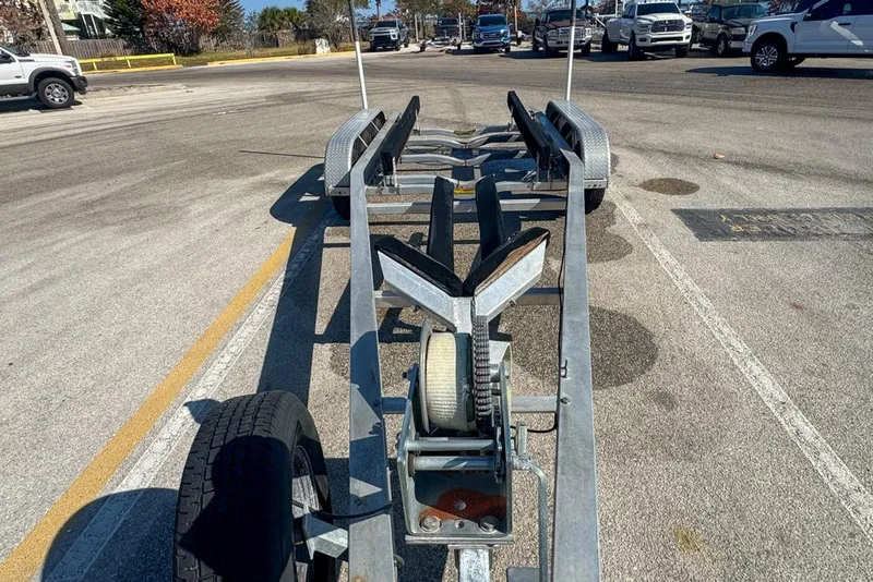 Slide: The Image of Boat trailer for 2021 Wellcraft 262 Fisherman in parking lot. - 99