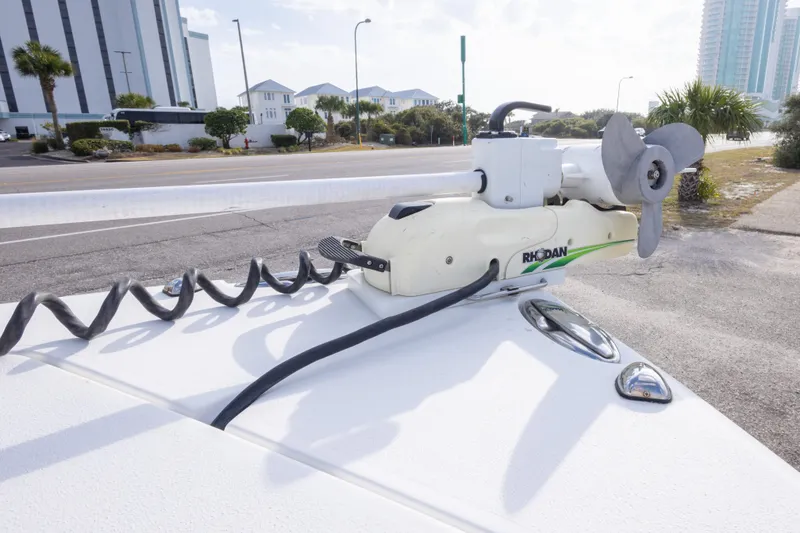 Slide: The Image of 2016 Sea Hunt Gamefish 25 with Rhodan trolling motor on urban street. - 24