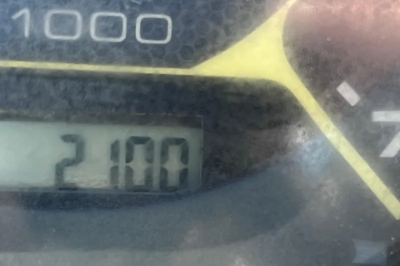 Slide: The Image of Close-up of a Sea Ray 21 SPX OB 2015 boat tachometer displaying 2100 RPM. - 41