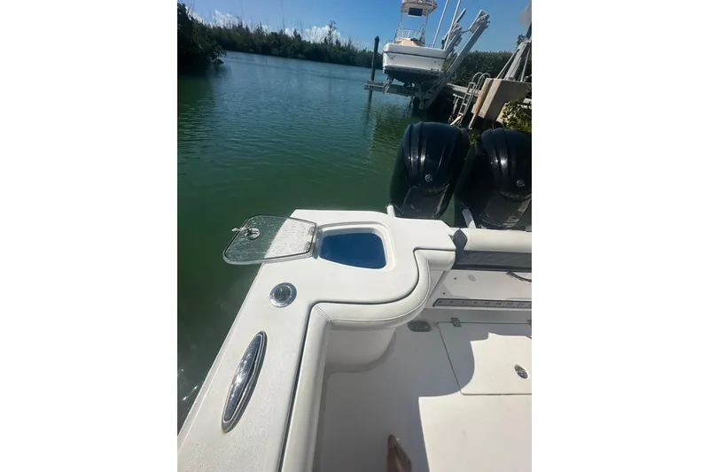 Slide: The Image of Dashboard of 2021 Tidewater 292 CC Adventure boat with digital display and controls. - 14