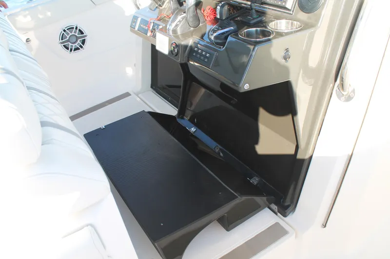 Slide: The Image of 2023 Pursuit S 378 Sport boat interior with control panel and seating. - 47