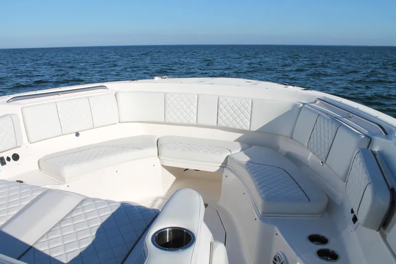 Slide: The Image of Luxurious seating on 2023 Pursuit S 378 Sport boat with ocean view. - 49