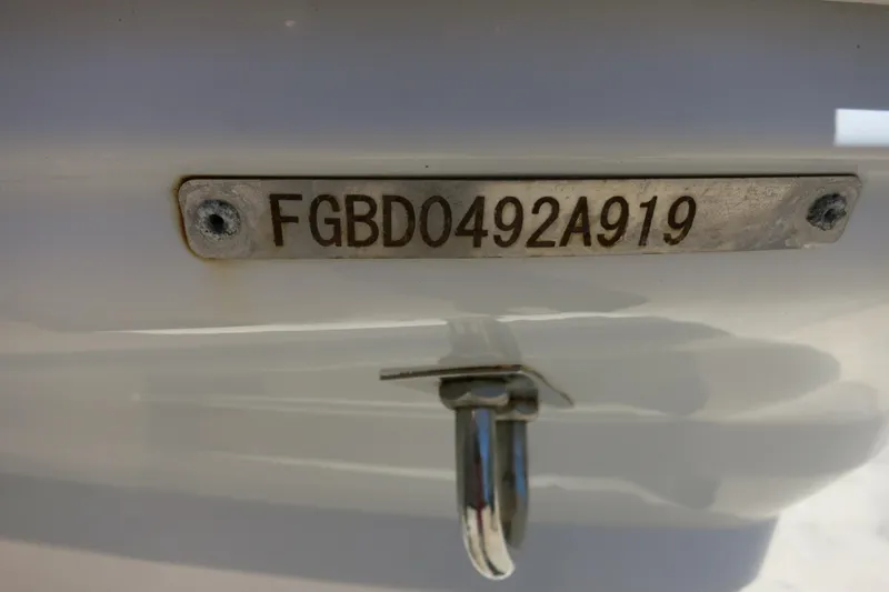 Slide: The Image of 2019 Chaparral 21 H2O Sport OB boat hull identification number (HIN) plate. - 27