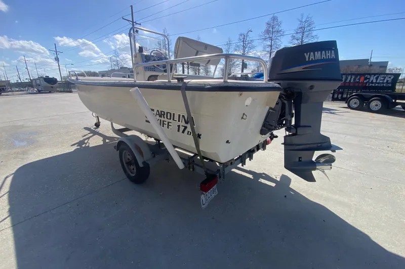 Slide: The Image of 2007 Carolina Skiff 1780 DLX boat with Yamaha outboard motor on trailer. - 6