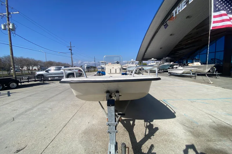 Slide: The Image of 2007 Carolina Skiff 1780 DLX boat on trailer, outdoor dealership display. - 9