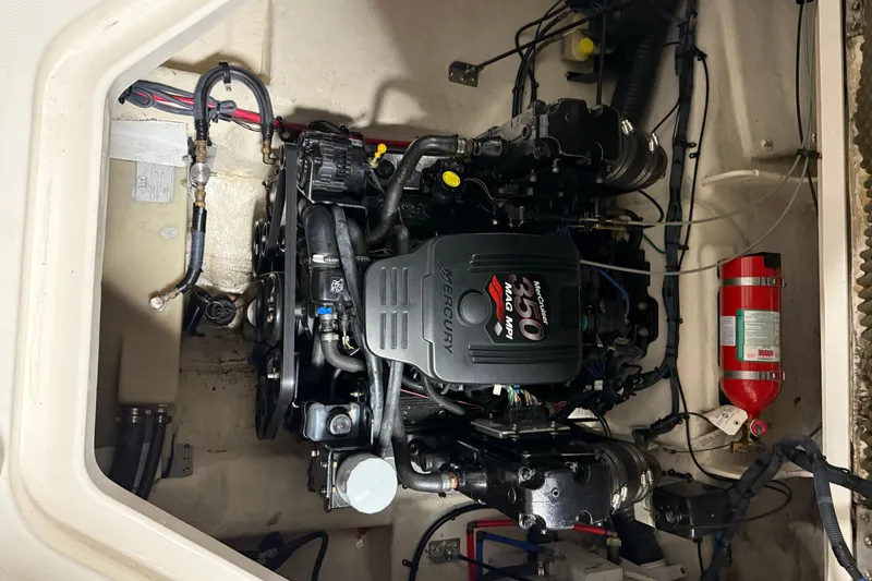 Slide: The Image of Engine compartment of a 2007 Sea Ray 240 Sundancer with Mercury 350 MAG MPI engine. - 15
