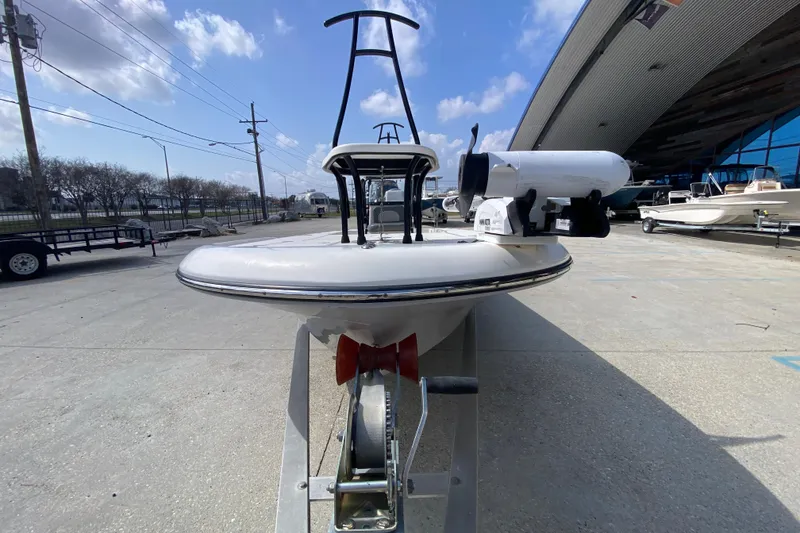 Slide: The Image of 2022 Composite Research Spyder FX-19 Vapor boat on trailer, outdoor display. - 13