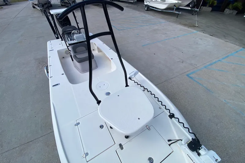 Slide: The Image of 2022 Composite Research Spyder FX-19 Vapor boat, white deck, docked outdoors. - 16