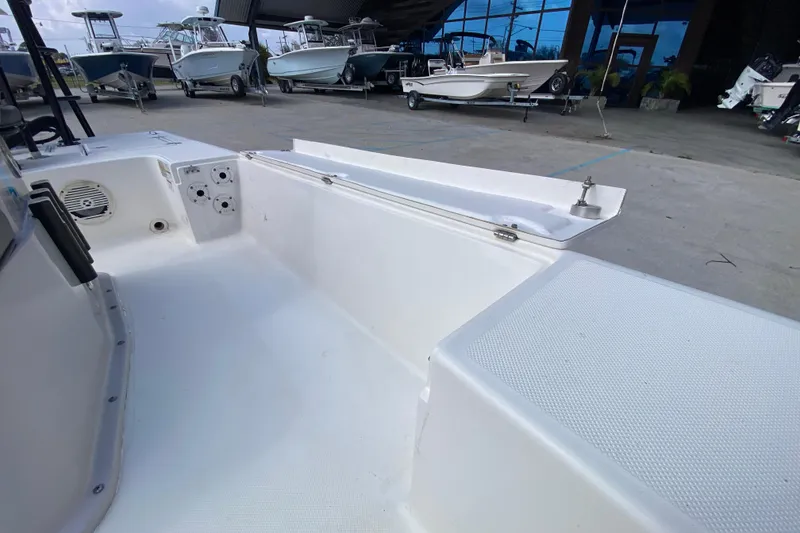 Slide: The Image of 2022 Composite Research Spyder FX-19 Vapor boat interior at a marina. - 18