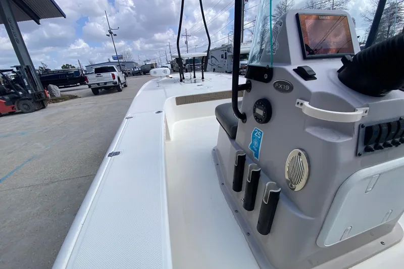 Slide: The Image of 2022 Composite Research Spyder FX-19 Vapor boat interior with control panel and seating. - 22