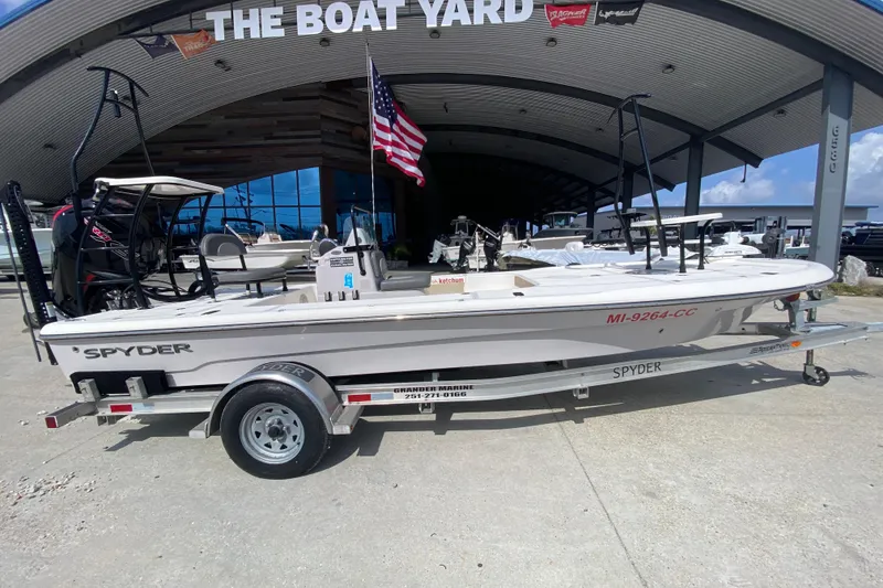 Slide: The Image of 2022 Composite Research Spyder FX-19 Vapor boat on trailer at dealership. - 4