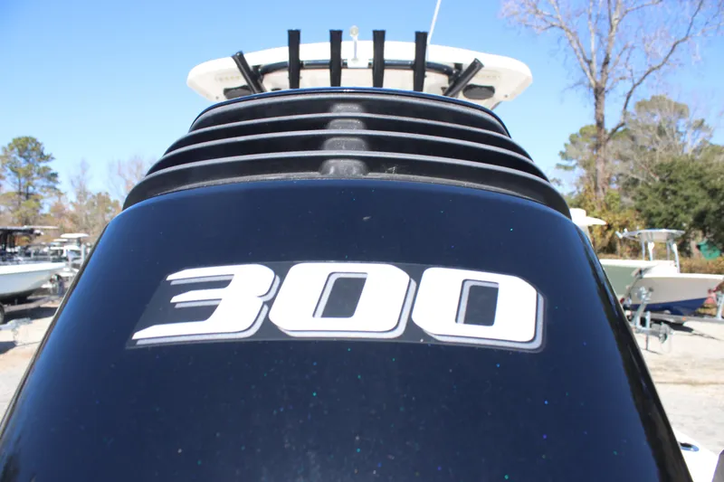 Slide: The Image of 2022 Sea Pro 248 Bay boat with 300 horsepower engine, outdoor display. - 6