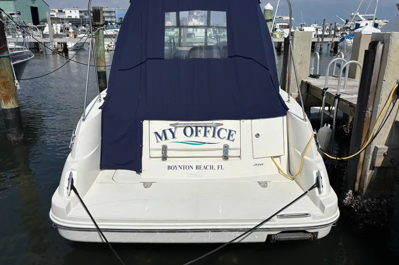 Slide: The Image of 2009 Sea Ray Sundancer 310 docked in Boynton Beach, FL, named "My Office." - 2