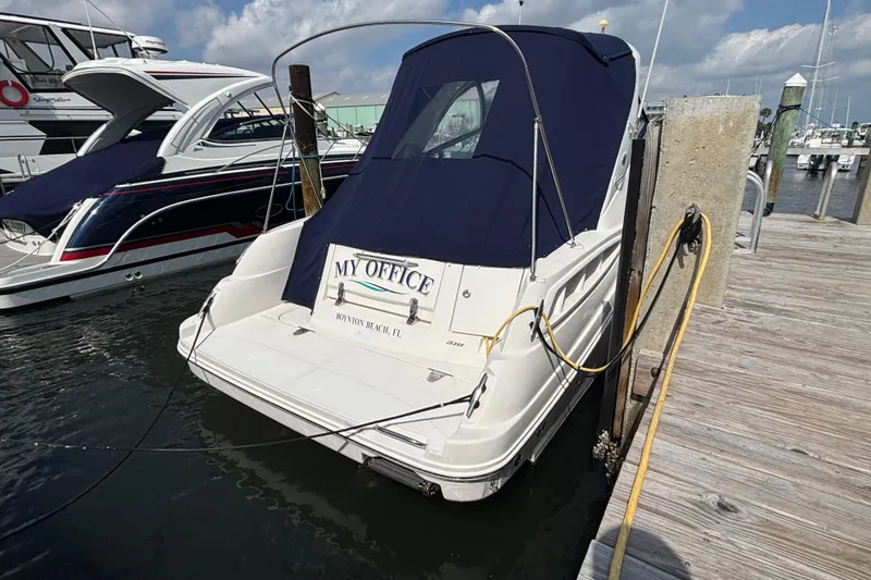 Slide: The Image of 2009 Sea Ray Sundancer 310 docked, named "My Office," Boynton Beach, Florida. - 4