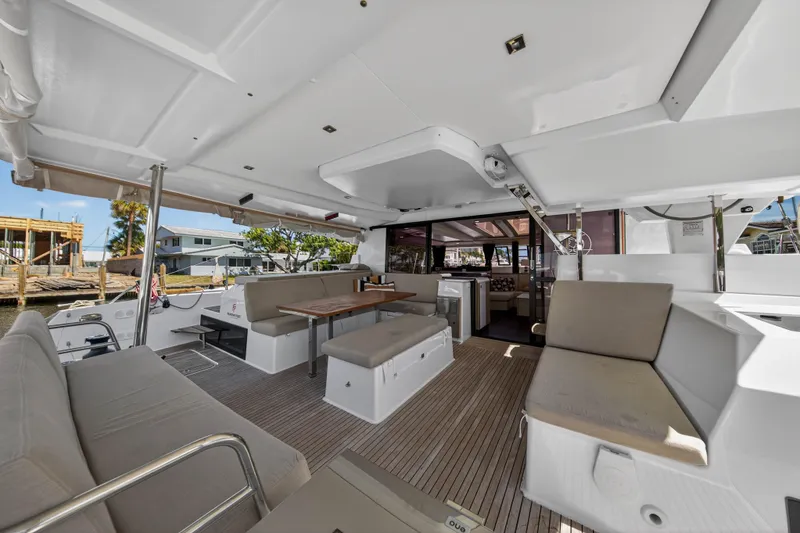 Slide: The Image of Spacious interior of 2022 Fountaine Pajot Tanna 47 catamaran with seating and dining area. - 12