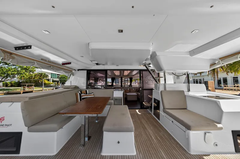 Slide: The Image of Spacious interior of 2022 Fountaine Pajot Tanna 47 catamaran with seating and dining area. - 13