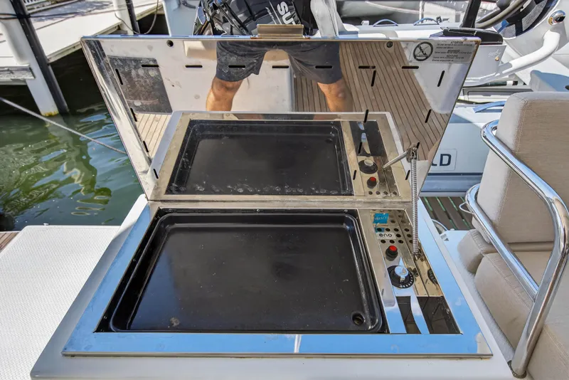 Slide: The Image of Outdoor grill on 2022 Fountaine Pajot Tanna 47 yacht, featuring sleek stainless steel design. - 21