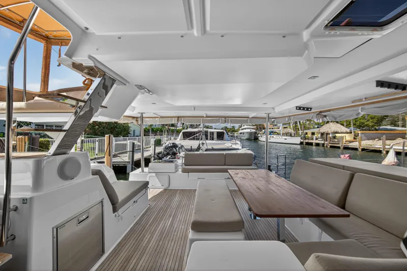 Slide: The Image of Spacious interior of 2022 Fountaine Pajot Tanna 47 catamaran docked at marina. - 24