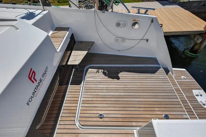Slide: The Image of 2022 Fountaine Pajot Tanna 47 yacht deck with wood finish and sleek design. - 32