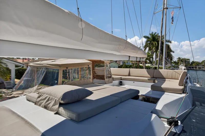 Slide: The Image of 2022 Fountaine Pajot Tanna 47 yacht with spacious deck and comfortable seating. - 48