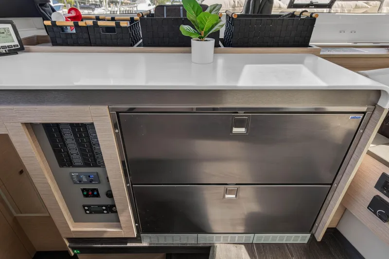 Slide: The Image of Modern kitchen area in 2022 Fountaine Pajot Tanna 47 yacht with sleek appliances. - 69
