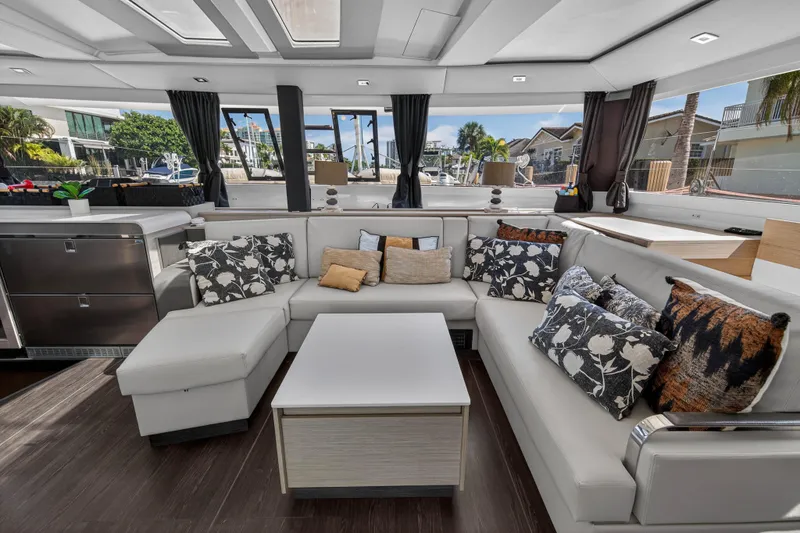 Slide: The Image of Luxurious interior of 2022 Fountaine Pajot Tanna 47 catamaran with elegant seating and decor. - 74