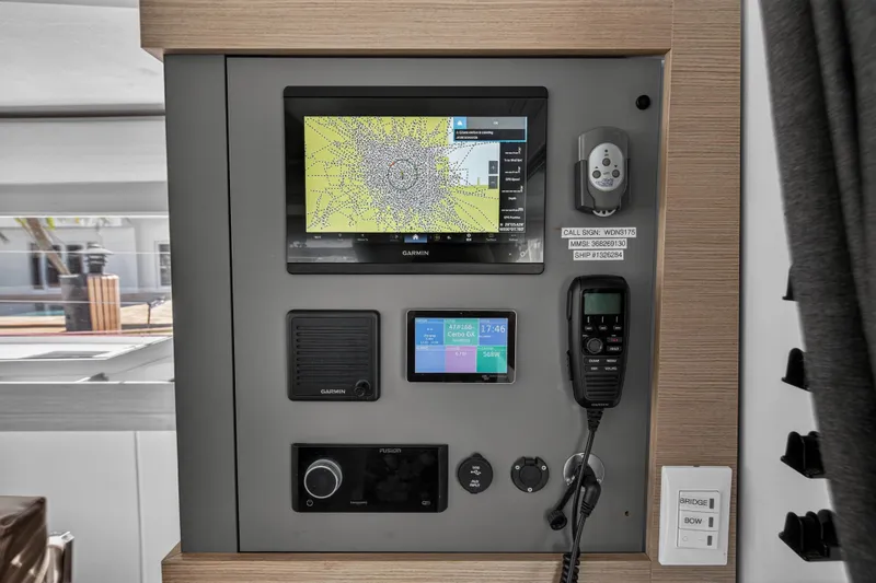 Slide: The Image of Control panel of 2022 Fountaine Pajot Tanna 47 yacht with navigation and communication equipment. - 77