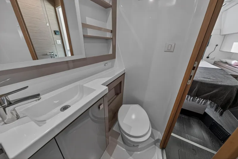 Slide: The Image of Modern bathroom interior on 2022 Fountaine Pajot Tanna 47 yacht, featuring sleek sink and toilet. - 87