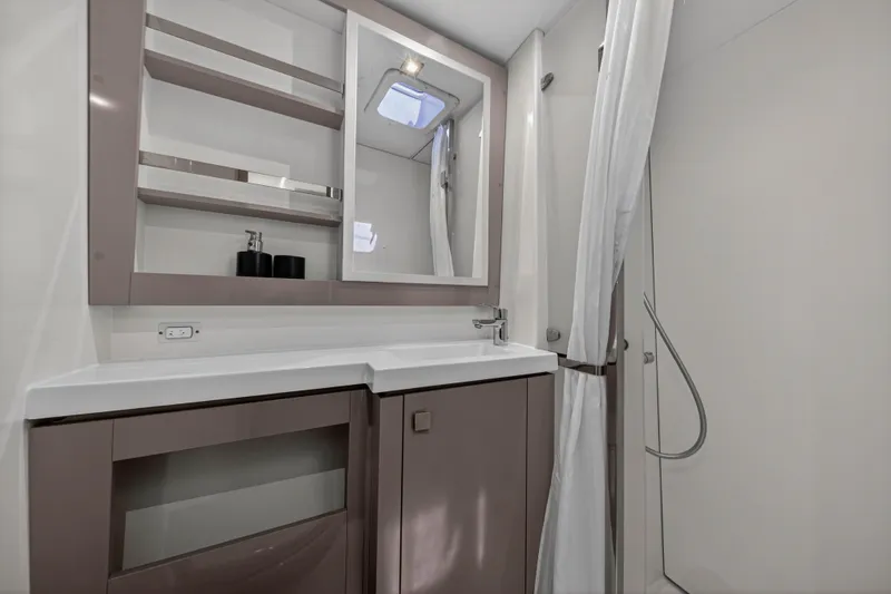 Slide: The Image of Modern bathroom interior of 2022 Fountaine Pajot Tanna 47 yacht, featuring sleek design and fixtures. - 95