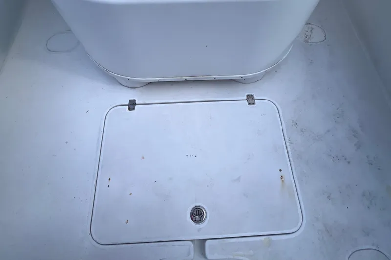 Slide: The Image of 2004 Yellowfin 36 Offshore boat deck with storage hatch. - 36