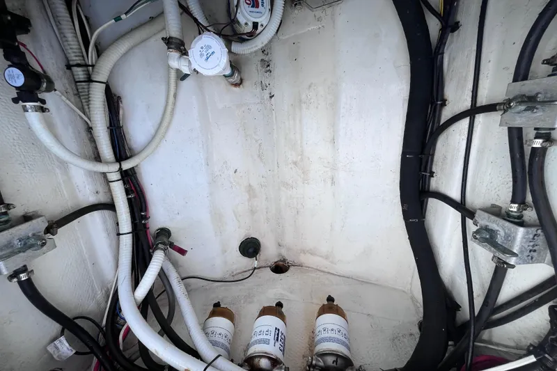 Slide: The Image of 2004 Yellowfin 36 Offshore boat wiring and fuel system components. - 38